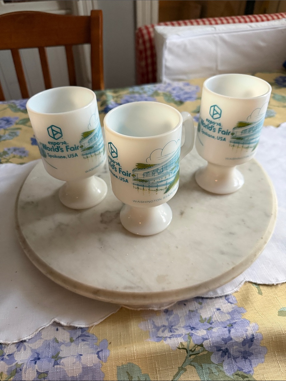 White Pedestal World's Fair Mugs with Teal & Green Graphics